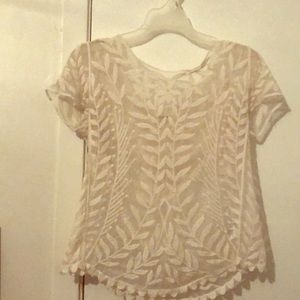 Off white top with design